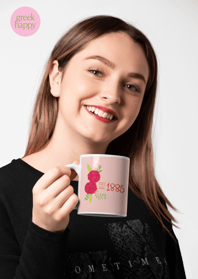 Alpha Chi Omega Sorority Mug shown in woman's hand