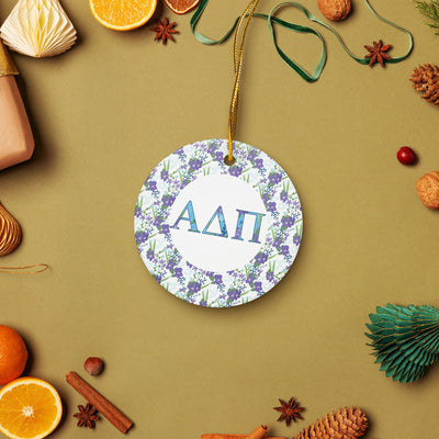 Alpha Delta Pi holiday ornament shown in lifestyle setting showing holiday accents