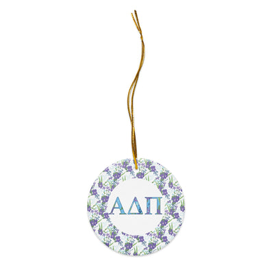 Alpha Delta Pi Holiday ornament shown with gold hanging string and filled letters