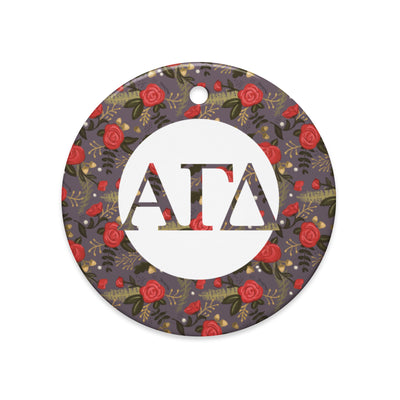 Alpha Gamma Delta Holiday Ornament shown in full view showing filled Alpha Ga letters accented by our red rose floral print