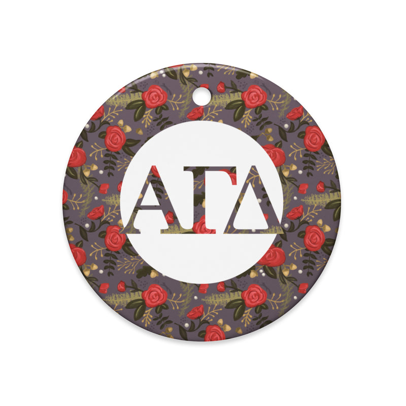 Alpha Gamma Delta Holiday Ornament shown in full view showing filled Alpha Ga letters accented by our red rose floral print