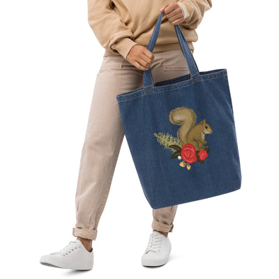 Alpha Gamma Delta denim tote printed with Alpha Gam mascot in model's hands