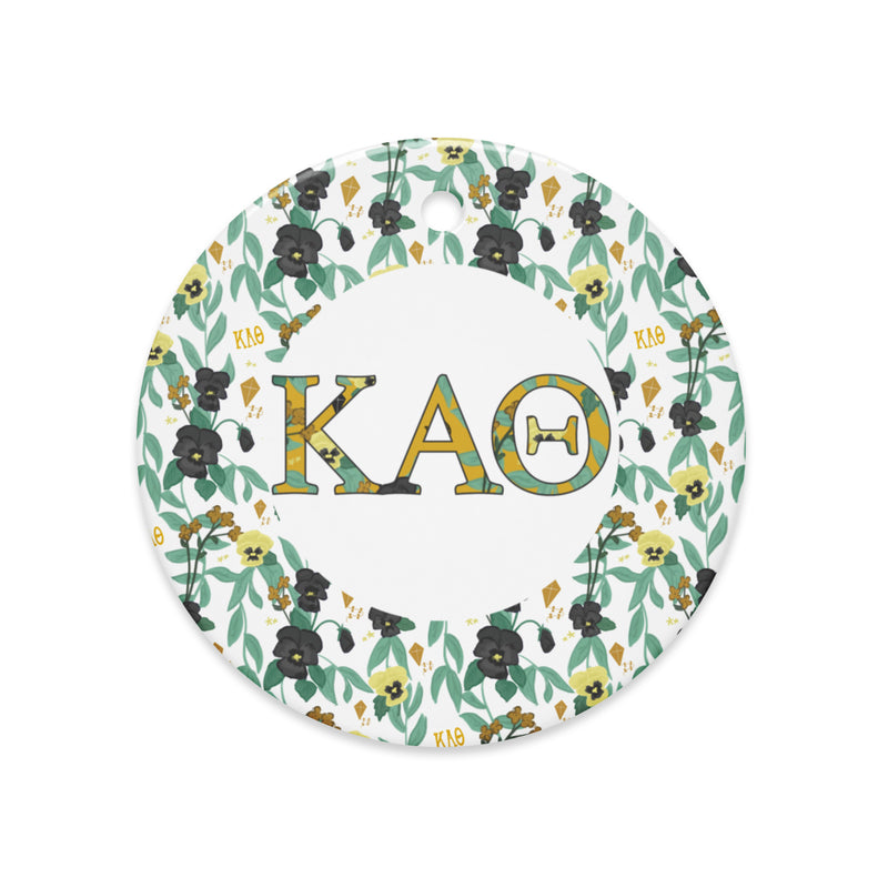 Kappa Alpha Theta Holiday Ornament shown in full view with filled Theta letters and floral print trim