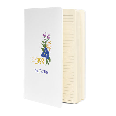 SAEPi hardcover journal with 1998 founding year design on a white background showing inside lined pages