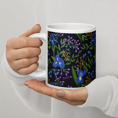 Sigma Alpha Epsilon Pi Floral Print Mug in 20 oz size shown in model's hands