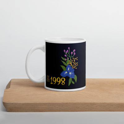 Sigma Alpha Epsilon Pi Founding Year Mug with artist-drawn SAEPi Design on cutting board