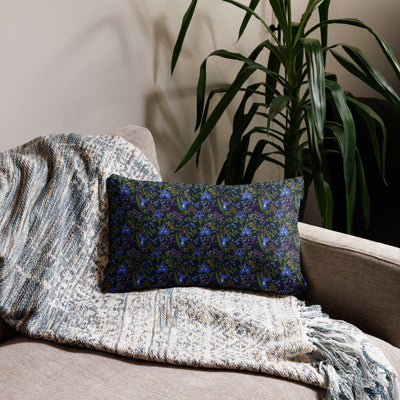 Sigma Alpha Epsilon Pi Lioness Pillow showing iris floral print in dark blue on couch