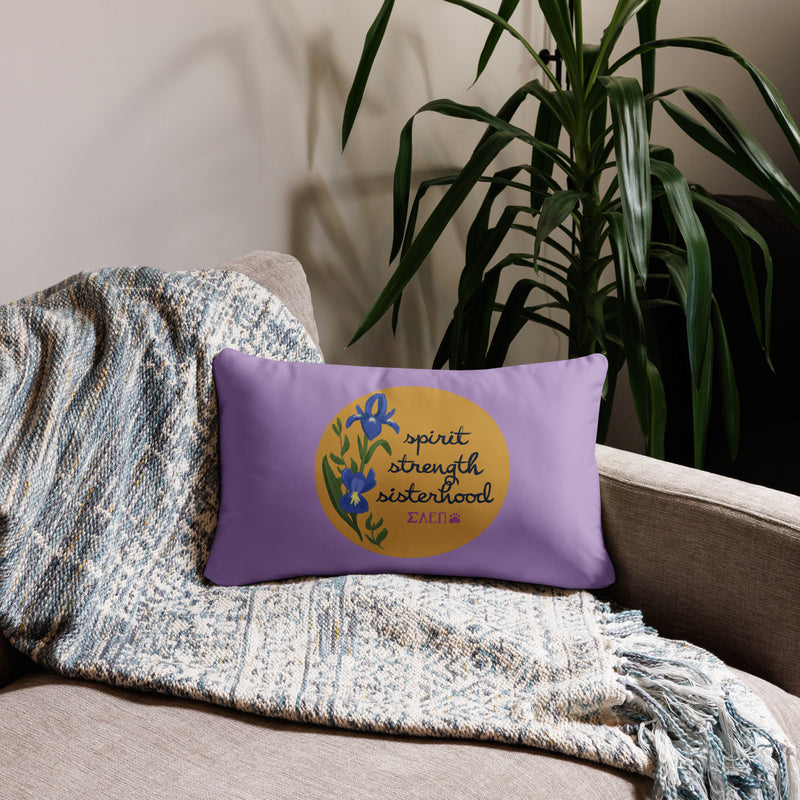 SAEPi reversible pillow showing front of pillow with motto design on couch