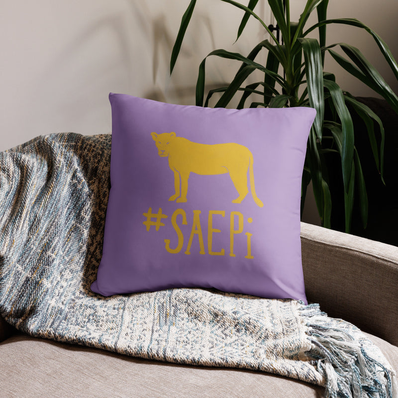 SAEPi reversible pillow in 22" x 22" size showing mascot design on couch