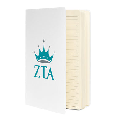 ZTA Logo Hardcover Journal in white showing inside lined pages