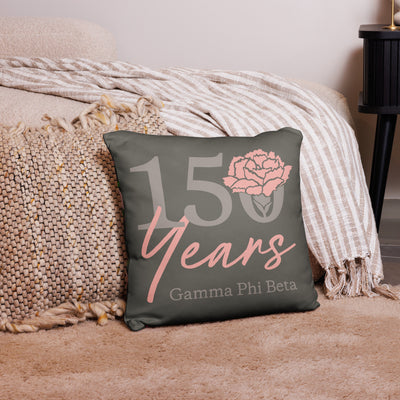 G Phi 150th Anniversary Brownstone Pillow in living room setting