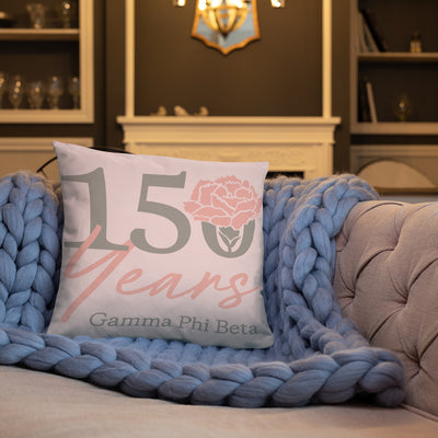 Gamma Phi Beta 150th Anniversary Reversible Pillow in light pink on couch