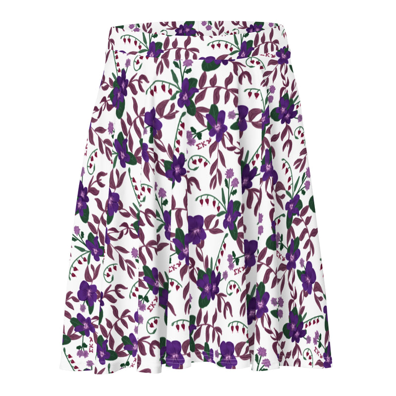Closer view of Sigma Kappa violet floral print skirt in white