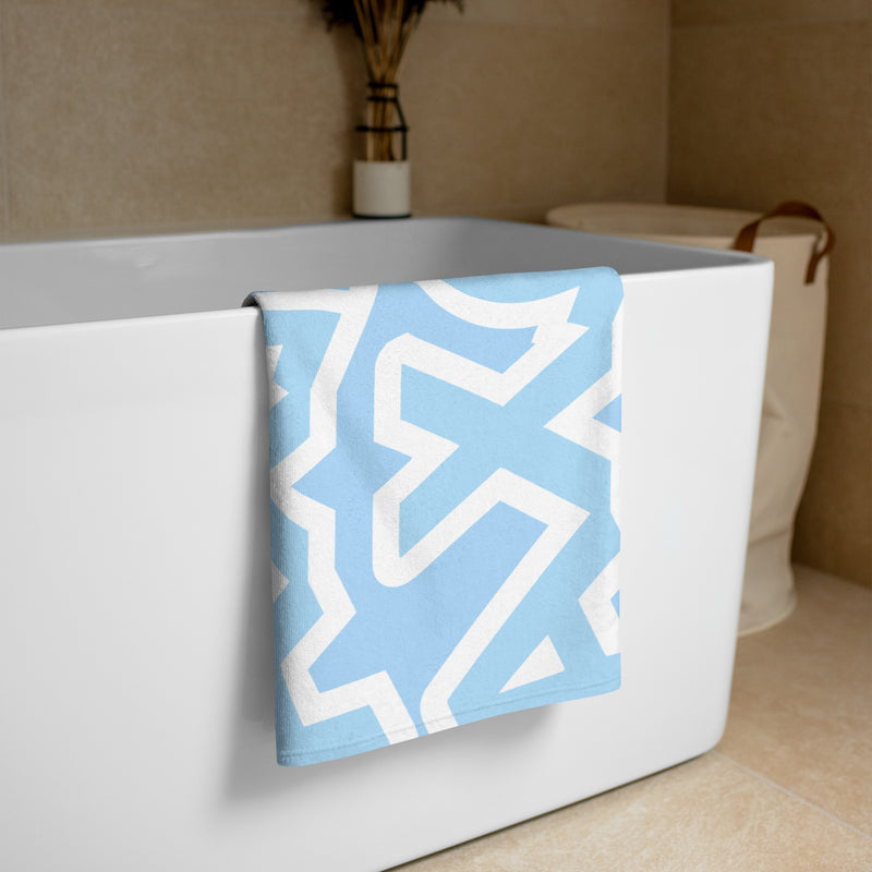 Alpha Chi Omega Beach and Bath Towel in blue and white in bathroom scene