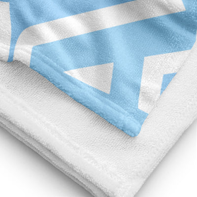 Alpha Chi Omega Beach and Bath Towel showing solid white reverse side
