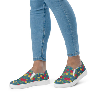 New! Alpha Chi Carnation Teal Floral Print Slip-on Canvas Shoes on woman's feet