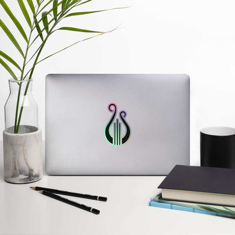 Our Alpha Chi Omega Lyre Holographic Sticker shown on laptop