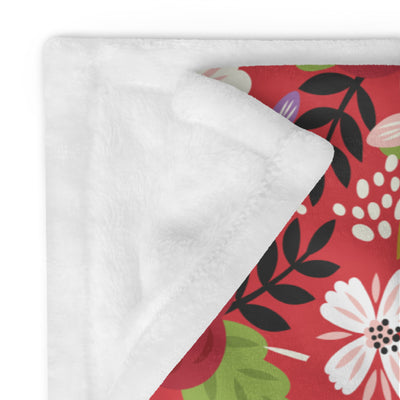 Alpha Chi Omega Modern Floral Blanket in scarlet showing solid white reverse side