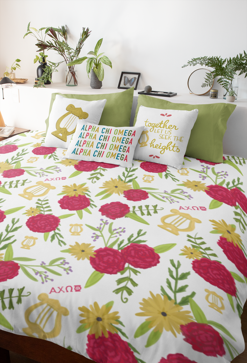 Alpha Chi Omega Sweet Dreams Bedding Bundle shown with carnation floral print and 3 pillows