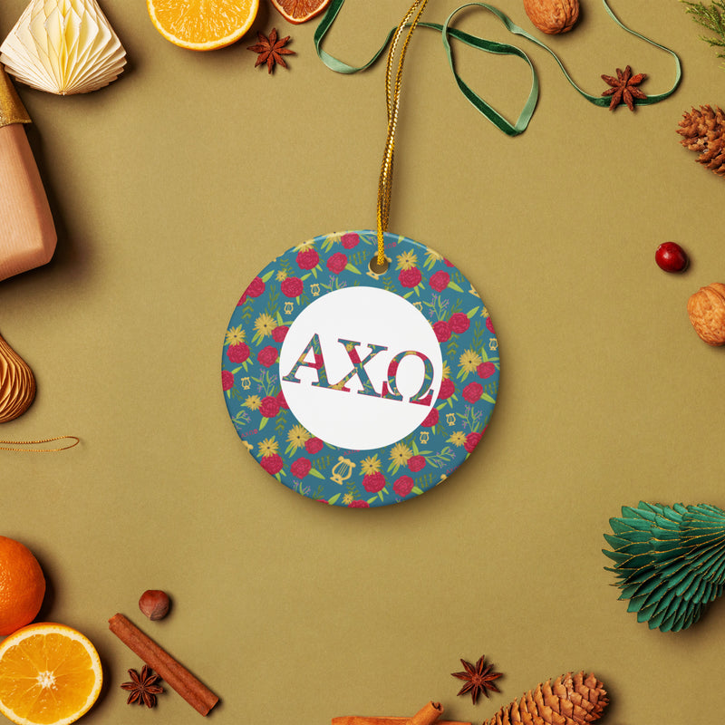Alpha Chi Omega holiday ornament shown in lifestyle setting with holiday accents