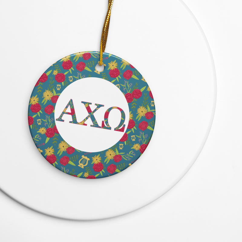 Alpha Chi Omega Holiday Ornament shown with gold hanging cord on white background