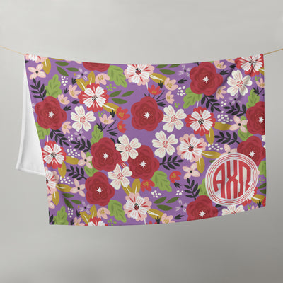 Alpha Chi Omega Modern Floral Blanket on clothesline