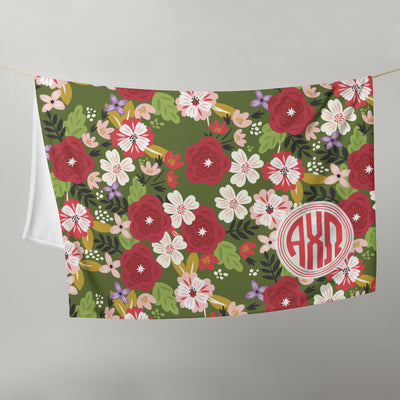 Alpha Chi Omega Throw Blanket in olive green on clothesline