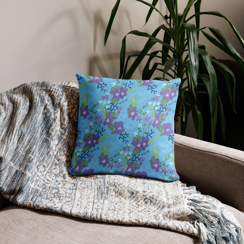 Alpha Delta Pi 1851 Sorority Pillow in 18 x 18 size showing woodland violet floral print in light blue shown on back