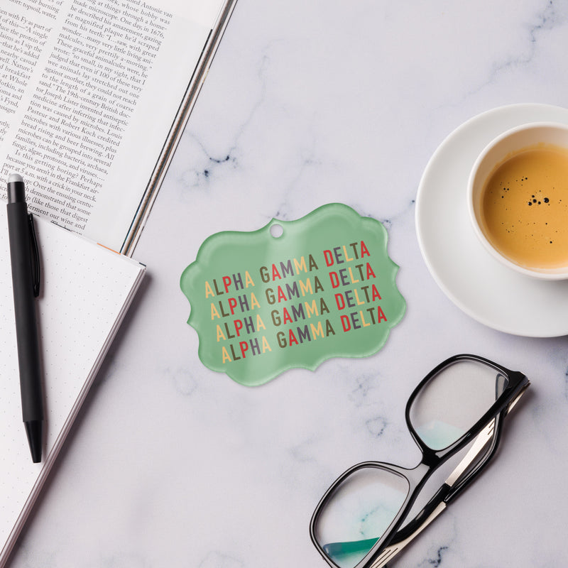 Alpha Gamma Delta Holiday Ornament in office setting