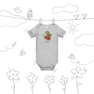Alpha Gamma Delta squirrel baby onesie shown on clothesline drawing in gray