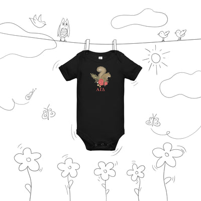 Alpha Gamma Delta squirrel baby onesie shown on clothesline drawing in black
