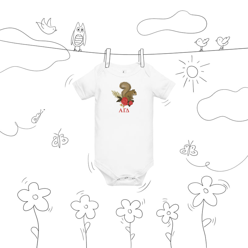 Alpha Gamma Delta squirrel baby onesie shown on clothesline drawing in white