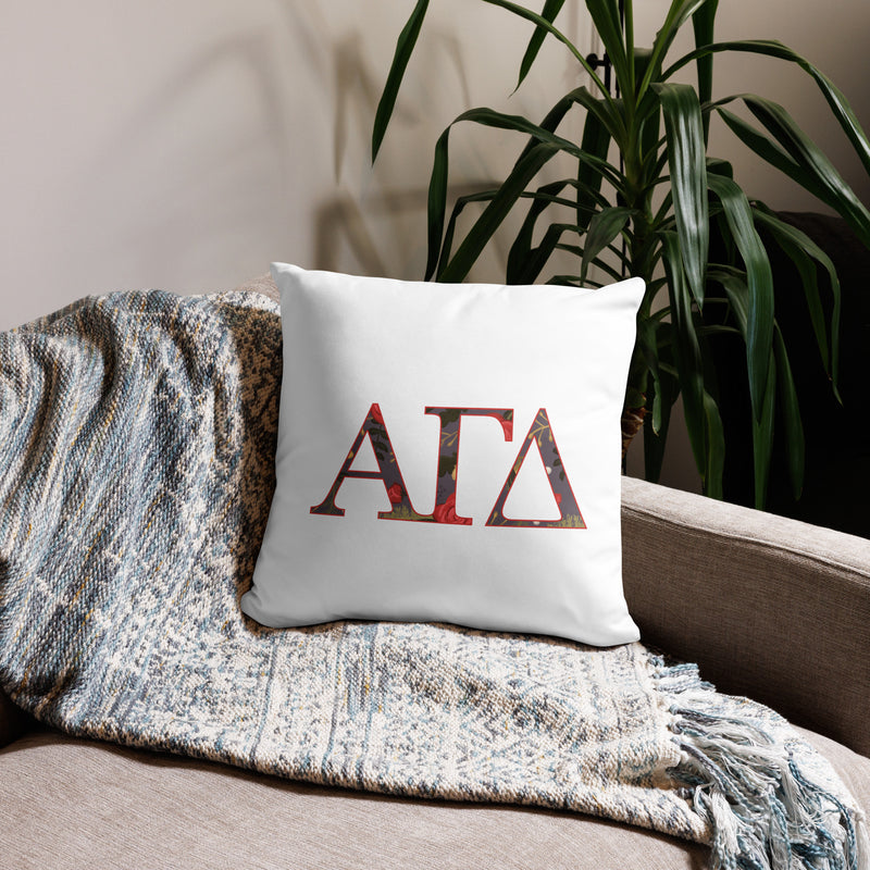alpha gamma delta letters pillow in white 18 x 18 size shown on couch