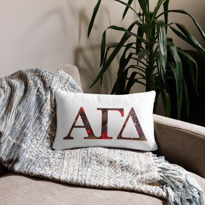 alpha gamma delta letters pillow in white 20 x 12 lumbar pillow size shown on couch