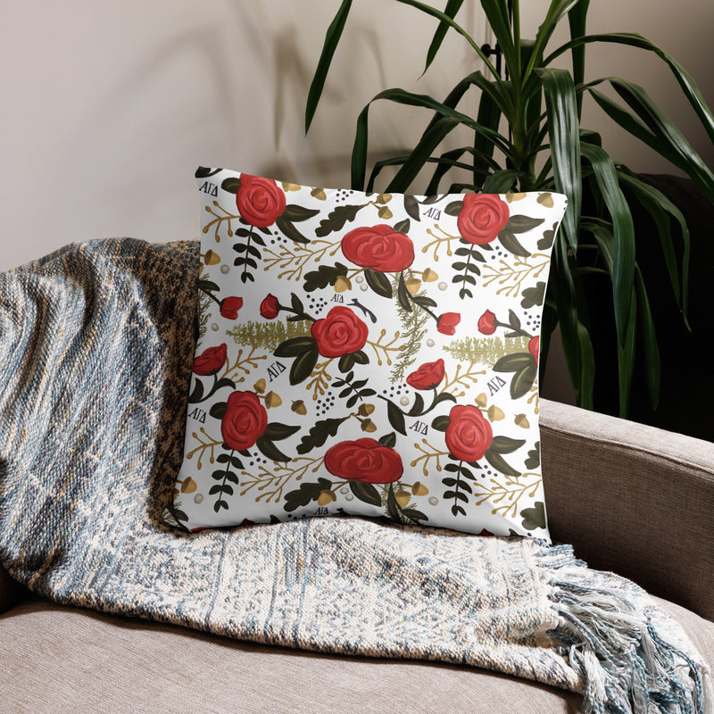 Alpha Gam Squirrel Mascot Pillow in 22 x 22 size in white floral print on back shown on couch