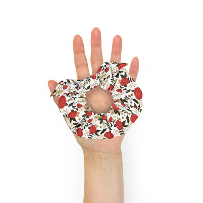 alpha gamma delta rose floral hair accessory in model's hand