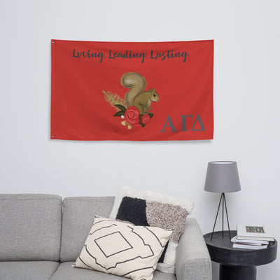 Alpha Gamma Delta Sorority Flag in red shown on living room wall