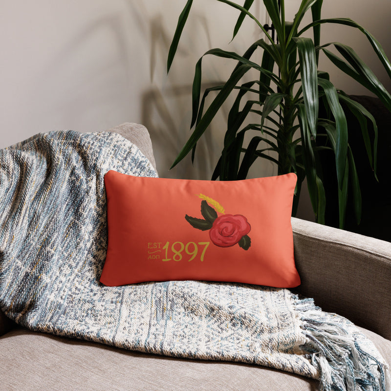 alpha omicron pi 1897 lumbar pillow in 20 x 12 coral shown on couch