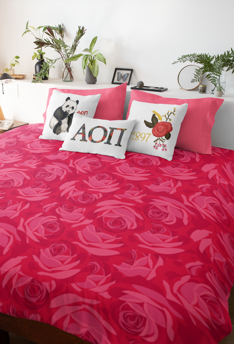 Alpha Omicron Pi Bedding Bundle with rose floral duvet cover and 3 AOPi pillows