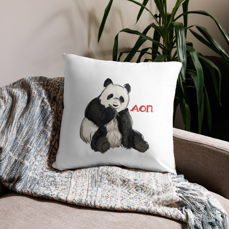 alpha omicron pi panda sorority pillow in 22 x 22 size in white shown on couch