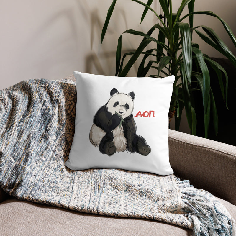 alpha omicron pi panda sorority pillow in 18 x 18 size in white shown on couch