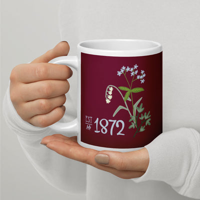 Alpha Phi 1872 Sorority Mug in 20 oz size shown in model's hands