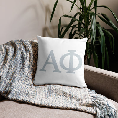 Alpha Phi Silver Letters Sorority Pillow showing front of pillow on couch