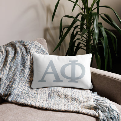 Alpha Phi Silver Letters Sorority Pillow in 20" x 12" lumbar size showing front on couch