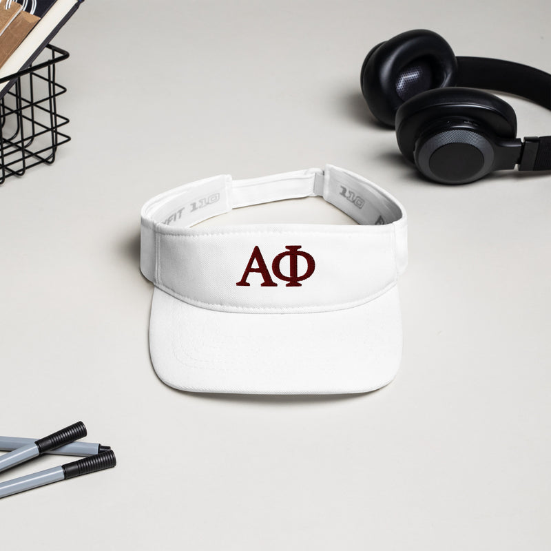 Alpha Phi Embroidered Greek Letter Visor in white with burgundy thread in lifestyle setting