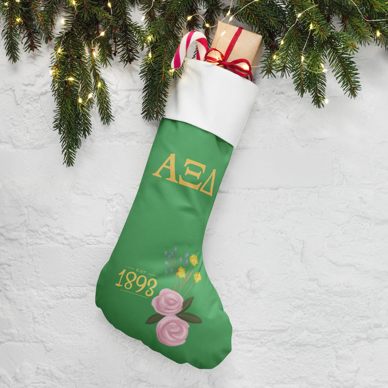 Alpha Xi 1893 Green Holiday Stocking with pine branches and lights