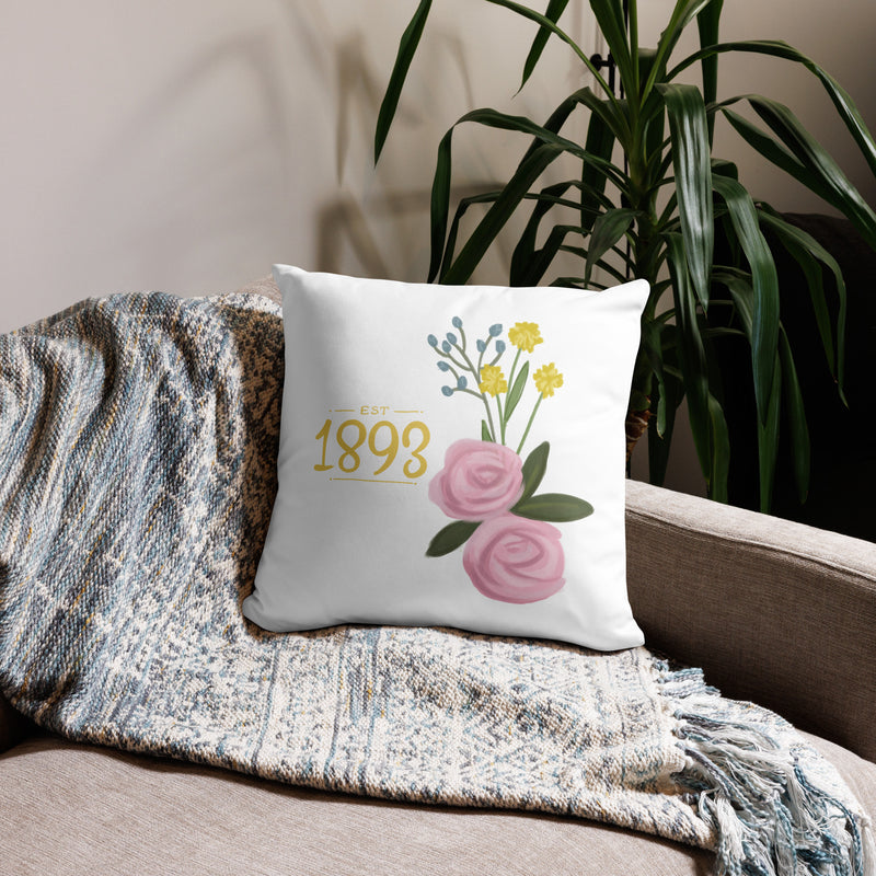 Alpha Xi Delta 1893 Sorority Pillow in white 18 x 18 size shown on couch