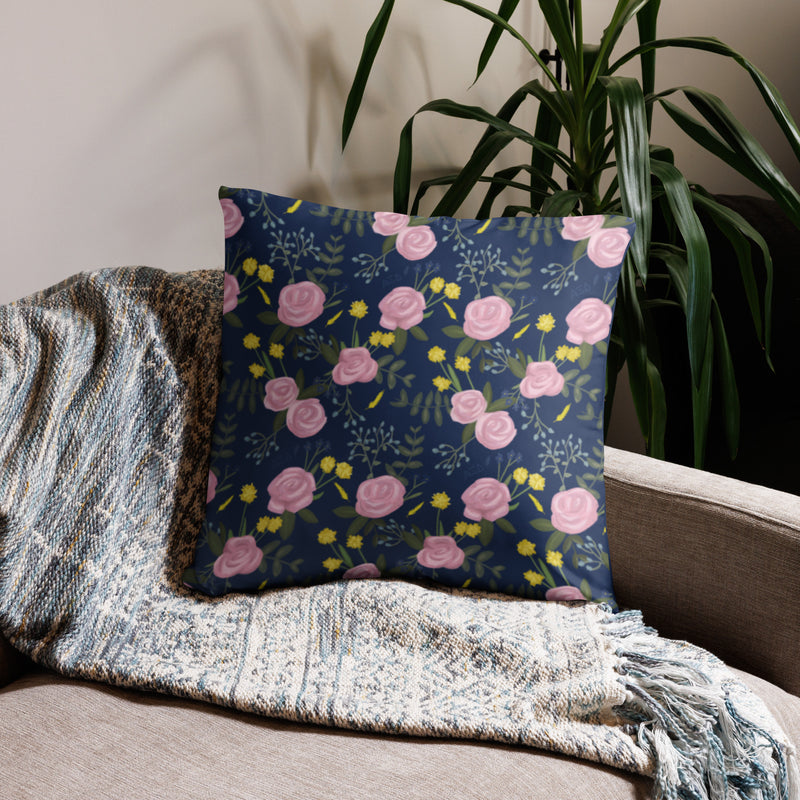 Alpha Xi Delta Sorority Pillow in 22" x 22" size shown on couch in navy blue floral print