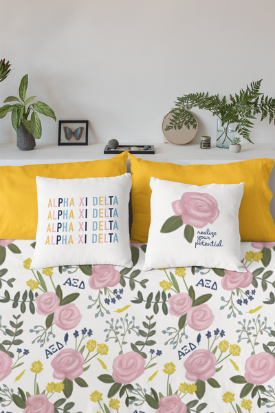 Alpha Xi Delta Duvet Cover with pink Killarney rose floral print in white shown in close up view