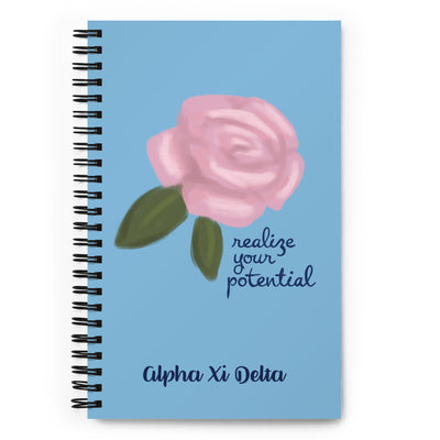 Alpha Xi Delta Sorority Notebook with realize your potential design in light blue on front